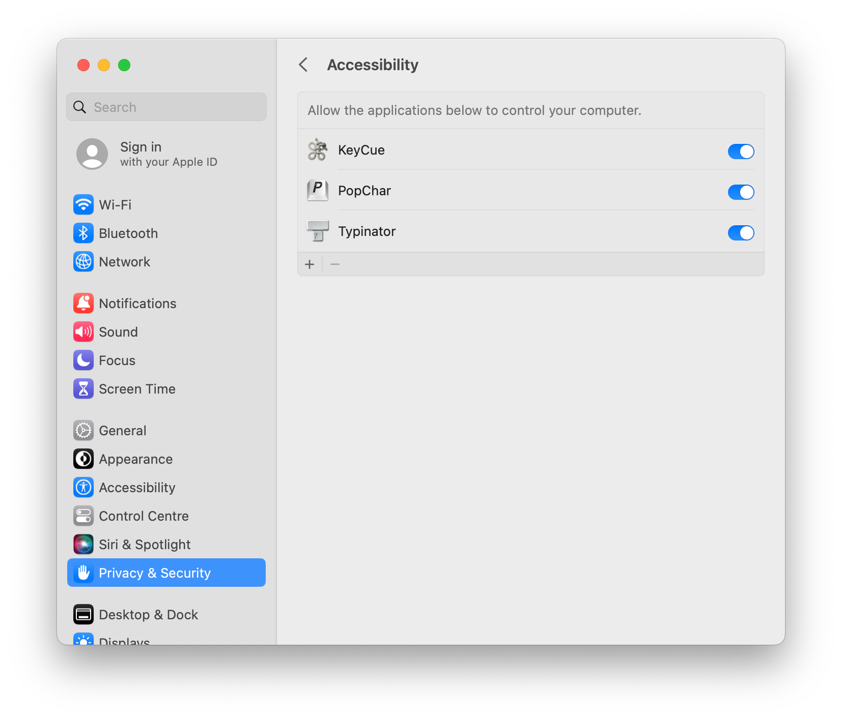 macOS Privacy & Security settings showing Typinator enabled under Accessibility permissions, alongside KeyCue and PopChar – allowing Typinator to control the computer for text expansion automation.